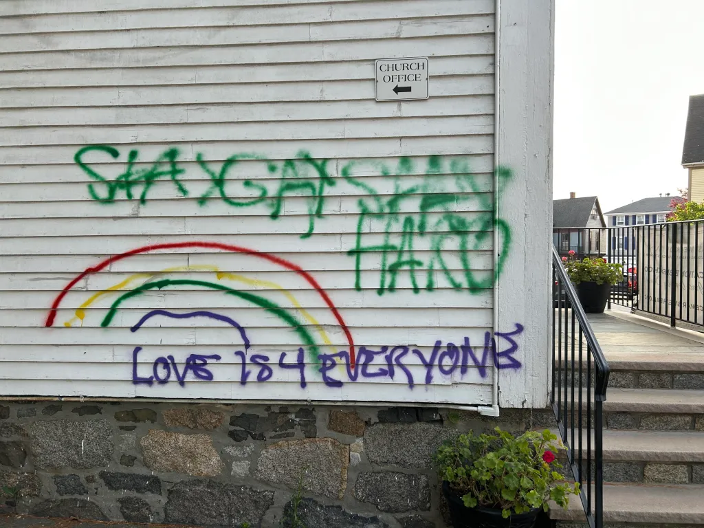 Church vandalized with LGBTQ graffiti after evicting preschool with Pride flags.