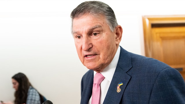 WASHINGTON - JUNE 1: Sen. Joe Manchin, D-W. Va., stops to speak to the cameras as he arrives to chair the Senate Energy and Natural Resources Committee hearing in the Dirksen Senate Office Building on Thursday, June 1, 2023.