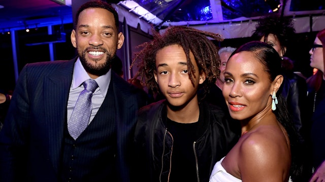 Actors Will Smith, son Jaden Smith and his wife Jada Pinkett Smith pose at the after party for the premiere of Warner Bros. Pictures' "Focus" at the W Hotel on February 24, 2015 in Los Angeles, California.