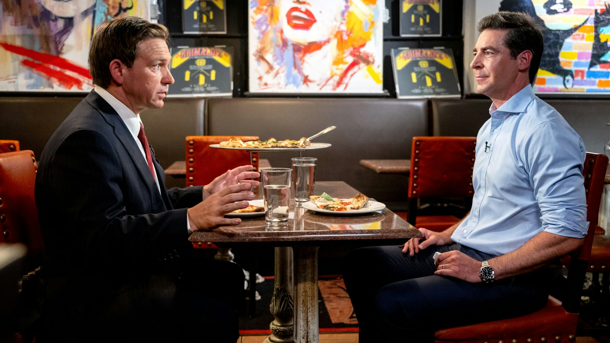 NEW YORK, NEW YORK - JUNE 29: Governor of Florida and presidential candidate Ron DeSantis with host Jesse Watters as he visits "Jesse Watters Primetime" at Grimaldi's Coal Brick-Oven Pizzeria on 6th Avenue in Manhattan on June 29, 2023 in New York City.