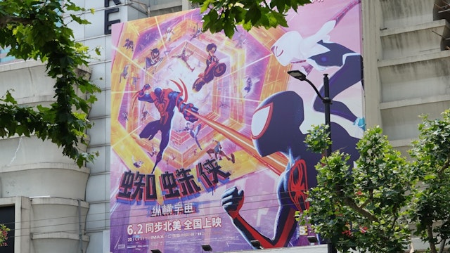 SHANGHAI, CHINA - MAY 31: A poster of film "Spider-Man: Across the Spider-Verse" is displayed on the exterior wall of a theatre on May 31, 2023 in Shanghai, China.