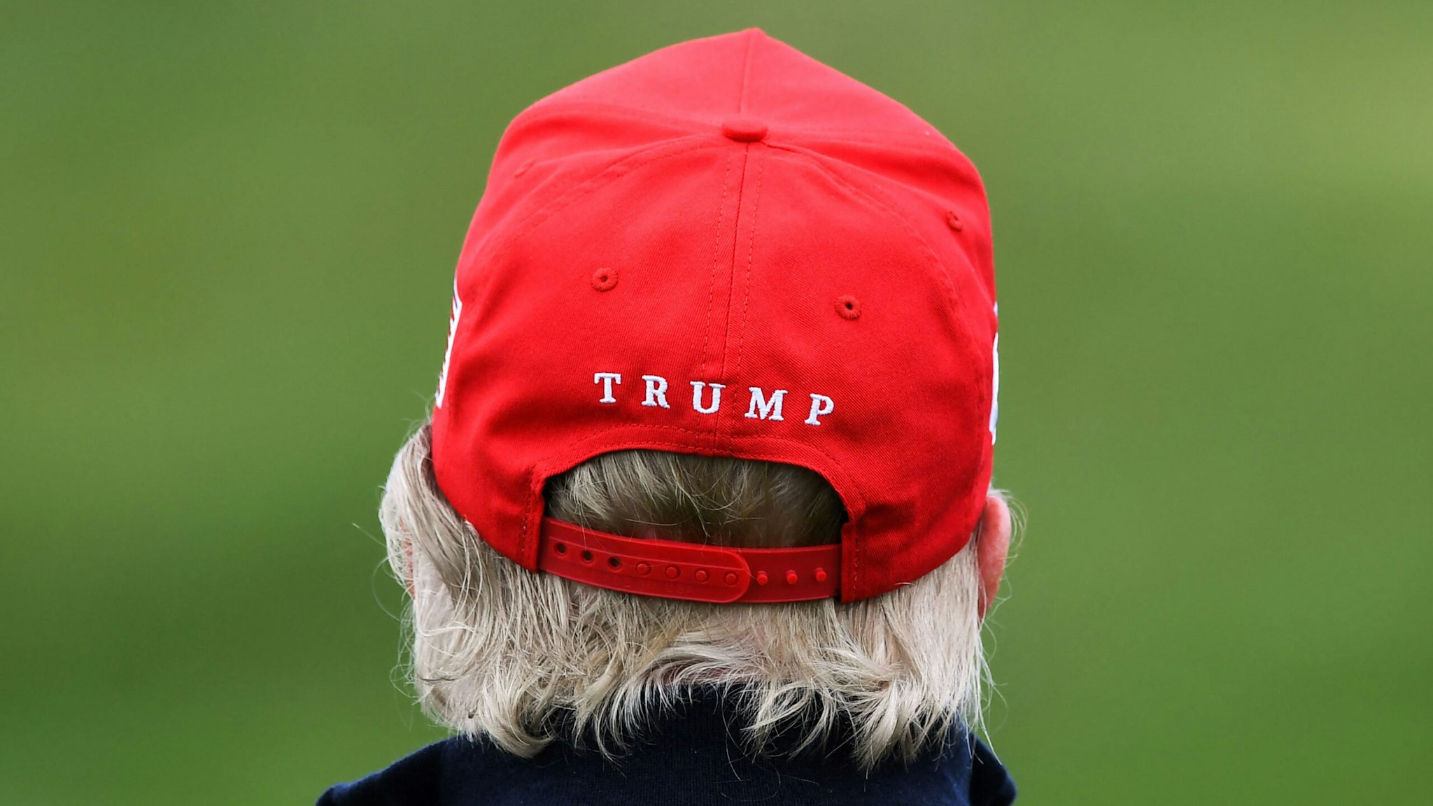 TOPSHOT - The cap of former US President Donald Trump is pictured as he plays golf at the Trump Turnberry Golf Courses, in Turnberry on the west coast of Scotland on May 2, 2023, during the second day of his first visit to the country since losing the Presidency.