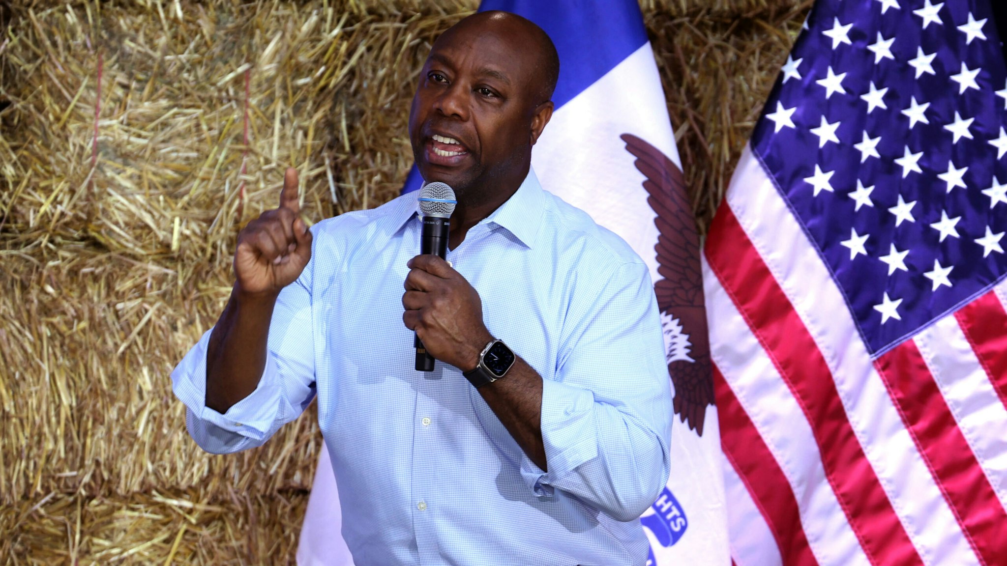 DES MOINES, IOWA - JUNE 03: Republican presidential candidate Senator Tim Scott (R-SC) speaks to guest during the Joni Ernst's Roast and Ride event on June 03, 2023 in Des Moines, Iowa. The annual event helps to raise money for veteran charities and highlight Republican candidates and platforms.