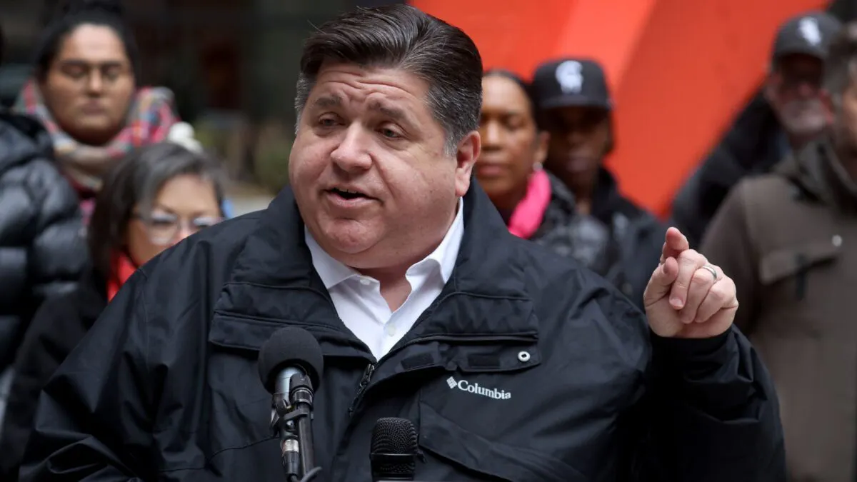 Illinois Gov. Signs Bill Preventing ‘Book Bans’ While Standing In Front Of Sexually Explicit Books