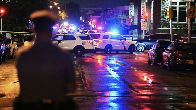 PHILADELPHIA, PENNSYLVANIA - JULY 3: Police work the scene of a shooting on July 3, 2023 in Philadelphia, Pennsylvania.