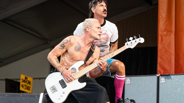 Flea and Anthony Kiedis of the Red Hot Chili Peppers performs during 2022 New Orleans Jazz & Heritage Festival at Fair Grounds Race Course on May 01, 2022 in New Orleans, Louisiana.