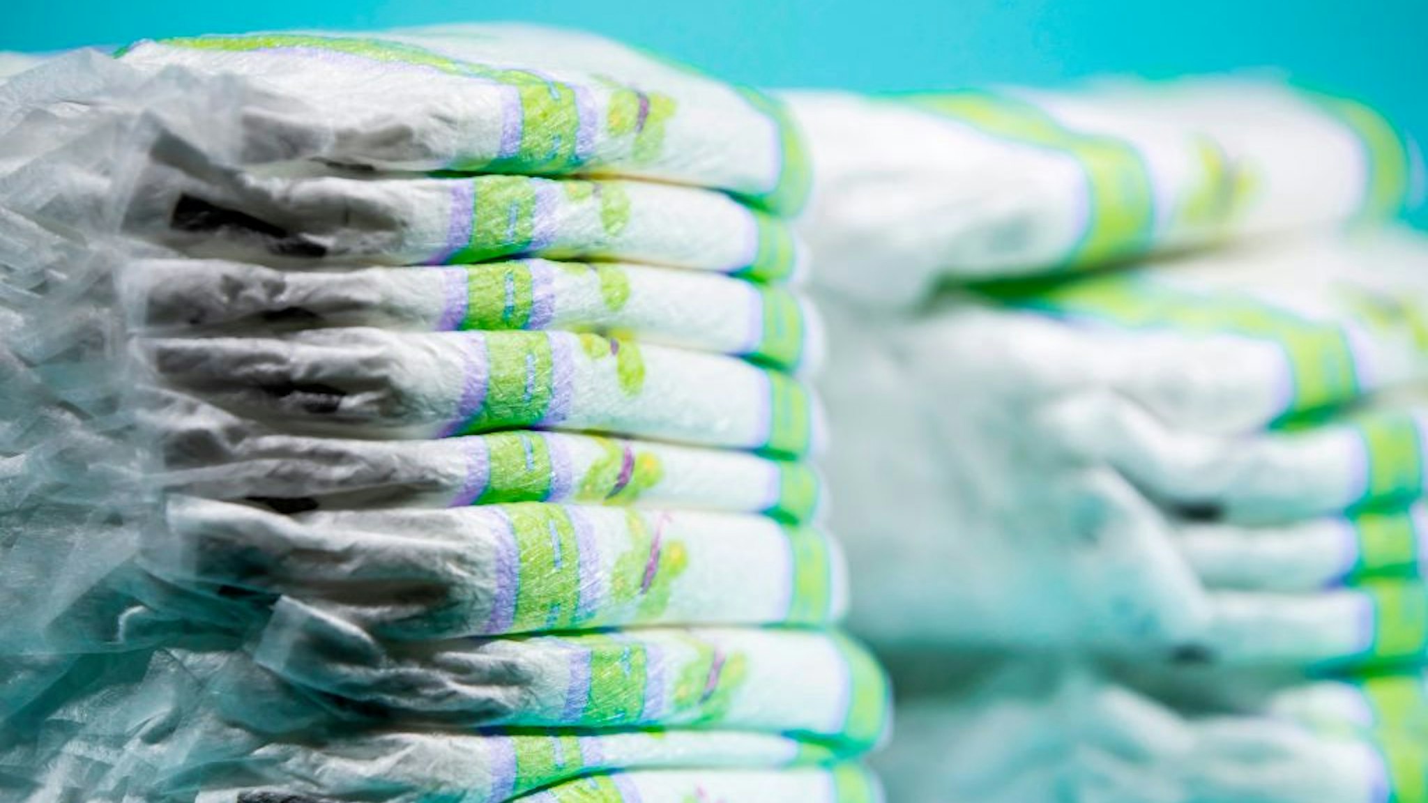 This photograph taken on August 23, 2018, shows a pile of nappies in a studio in Paris. - Eighteen months after an initial shocking survey by the magazine "60 million consumers" (60 Millions de consommateurs), the journal is again pointing to the alleged presence of potentially toxic residues in some baby nappies, but its findings are disputed by manufacturers. Twelve references were tested by the National Consumer Institute (INC) for the September issue of the magazine. For half, the tests revealed the presence of undesirable substances "in very small quantities". (Photo by JOEL SAGET / AFP) (Photo credit should read JOEL SAGET/AFP via Getty Images)
