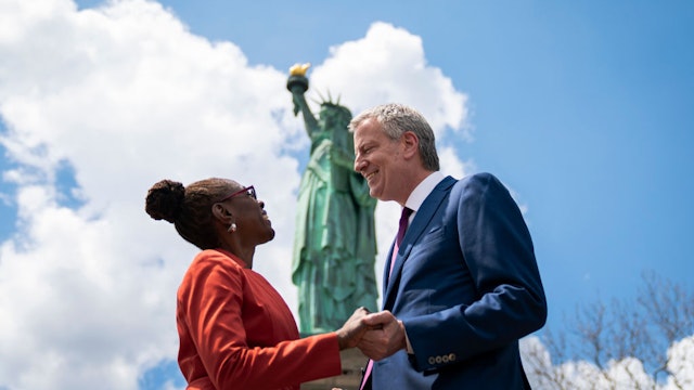 NEW YORK, NY - MAY 16: New York City Mayor Bill de Blasio and his wife Chirlane McCray stop in front of the Statue of Liberty following a dedication ceremony for the new Statue of Liberty Museum, May 16, 2019 on Liberty Island in New York City. De Blasio announced on Thursday morning that he is launching a campaign for the presidency. (Photo by Drew Angerer/Getty Images)