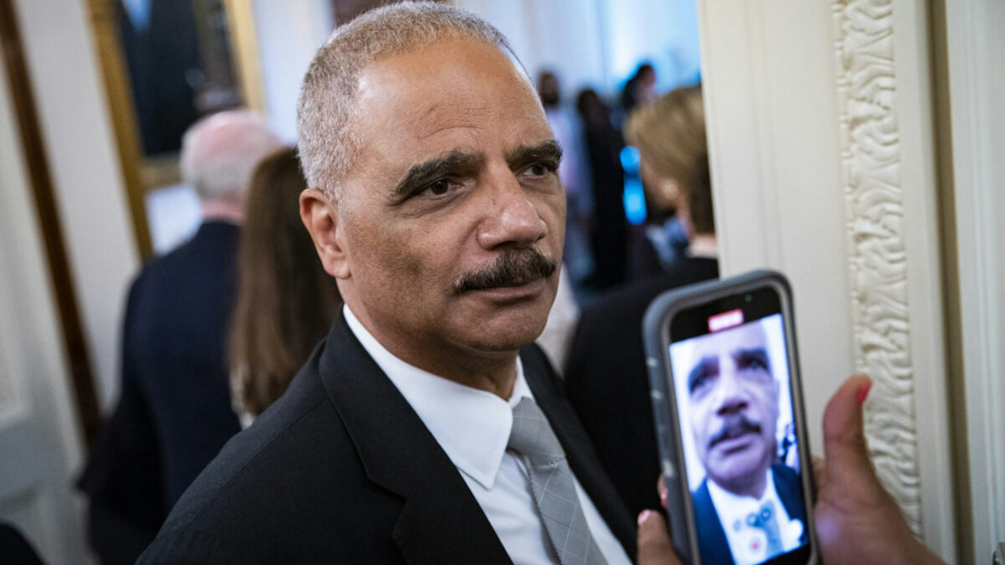 Eric Holder, former US attorney general, following a ceremony with former US President Barack Obama and former First Lady Michelle Obama for the unveiling of their official White House portraits in Washington, D.C., US, on Wednesday, Sept. 7, 2022.