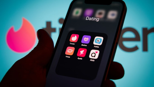 The Tinder app is seen on an iPhone mobile device in this illustration photo in Warsaw, Poland on 12 October, 2022. (Photo by STR/NurPhoto via Getty Images)