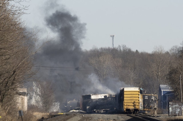 Smoke rises from a derailed cargo train in East Palestine, Ohio, on February 4, 2023. - The train accident sparked a massive fire and evacuation orders, officials and reports said Saturday. No injuries or fatalities were reported after the 50-car train came off the tracks late February 3 near the Ohio-Pennsylvania state border. The train was shipping cargo from Madison, Illinois, to Conway, Pennsylvania, when it derailed in East Palestine, Ohio.