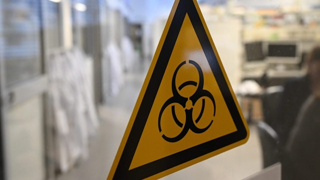 The symbol for Biohazard is displayed at the entrance to the laboratory at the Institute for Medical Immunology at Charité.
