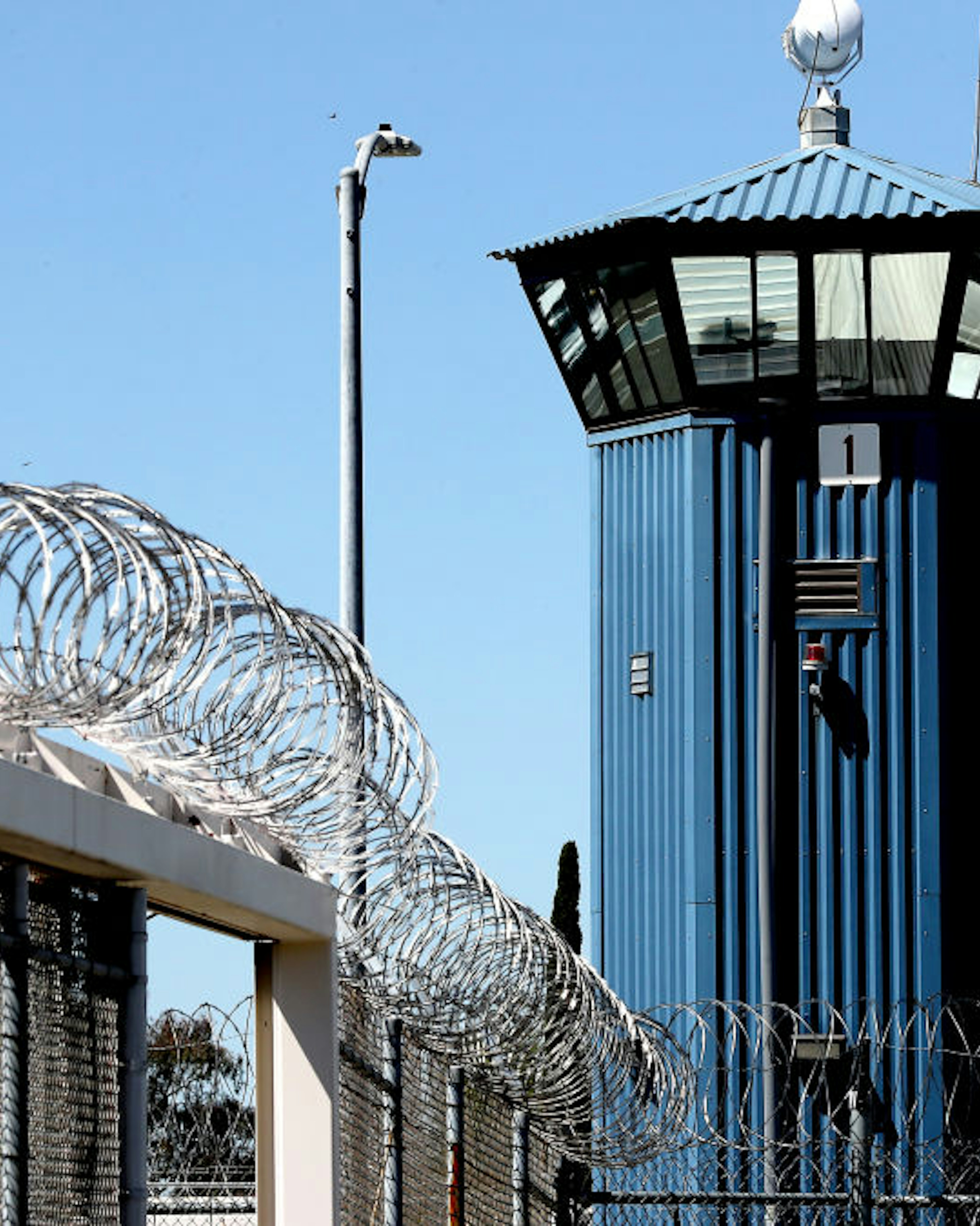 Represa CA - April 13: Razor wire tops a fence near the Short-Term Restricted Housing Unit at California State Prison, Sacramento. The unit is for prisoners in segregated or solitary confinement. The California legisature is considering another bill (AB 280) to restrict solitary confinement after a similar proposal died last year. (Luis Sinco / Los Angeles Times via Getty Images)