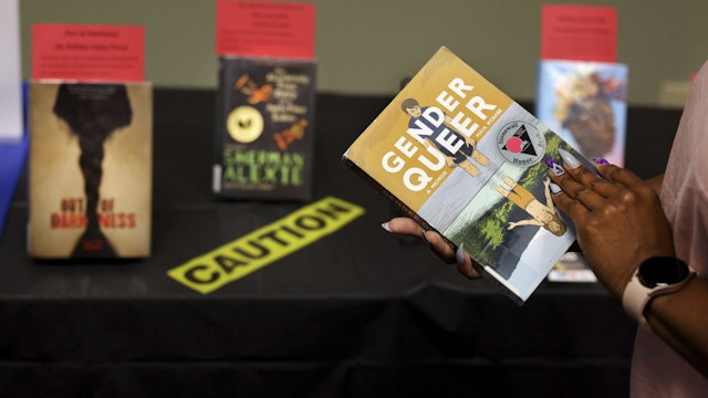 &quot;Gender Queer: A Memoir,&quot; by Maia Kobabe, is one of the banned and challenged books on display during Banned Books Week 2022 at the Lincoln Belmont branch of the Chicago Public Library on Sept. 22. (Chris Sweda/Chicago Tribune/Tribune News Service via Getty Images)