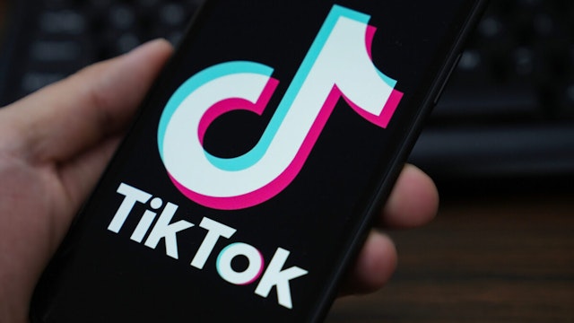 CHINA - 2023/05/24: In this photo illustration, the TikTok logo is displayed on the screen of a smartphone.