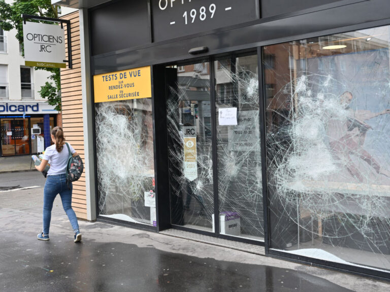 MONTIGNY LE BRETONNEUX, FRANCE - JULY 01: A damaged store is seen following fourth night of unrest triggered by the fatal police shooting of a teenager in Montigny-le-Bretonneux, west of Paris, France on July 01, 2023. (Photo by Mustafa Yalcin/Anadolu Agency via Getty Images)