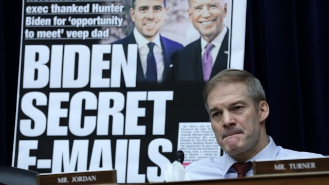 With a poster of a New York Post front page story about Hunter Biden’s emails on display, U.S. Rep. Jim Jordan (R-OH) listens during a hearing before the House Oversight and Accountability Committee at Rayburn House Office Building on Capitol Hill on February 8, 2023 in Washington, DC.