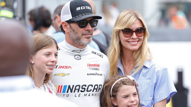 Jimmie Johnson of USA and wife Chandra Janway attend the 100th anniversary of the 24 Hours of Le Mans at the Circuit de la Sarthe June 10, 2023 in Le Mans, France.
