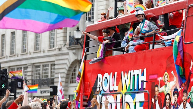 LONDON, ENGLAND - JULY 01: Gay Pride parade participants on a London Bus on July 01, 2023 in London, England. Pride in London is an annual LGBT+ festival and parade held each summer in London. 35,000 people are expected to march this year making the event the largest in London to date.