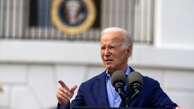 WASHINGTON, DC - JULY 04: President Joe Biden speaks to guests on the south lawn on July 04, 2023 in Washington, DC. The Bidens hosted a Fourth of July BBQ and concert with military families and other guests on the south lawn of the White House. (Photo by Tasos Katopodis/Getty Images)