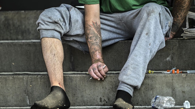 PHILADELPHIA, PENNSYLVANIA - JULY 06: Homeless people are seen on streets of the Kensington neighborhood as homelessness and drug addiction hit Philadelphia in Pennsylvania, United States on July 06, 2023. Many openly inject opioids into their hands, arms and necks. (Photo by Fatih Aktas/Anadolu Agency via Getty Images)
