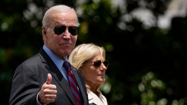 WASHINGTON, DC - JULY 14: U.S. President Joe Biden gives a thumbs up as he walks with first lady Jill Biden to Marine One on the South Lawn of the White House July 14, 2023 in Washington, DC. Biden is spending the weekend at Camp David in Maryland. (Photo by Drew Angerer/Getty Images)