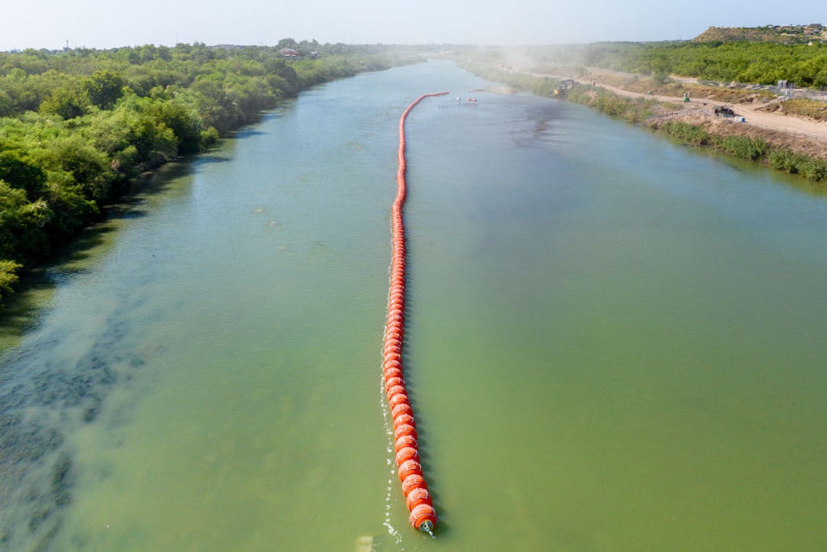 NextImg:Biden Admin Threatens To Sue Texas Over Barriers On Rio Grande Blocking Illegal Immigration