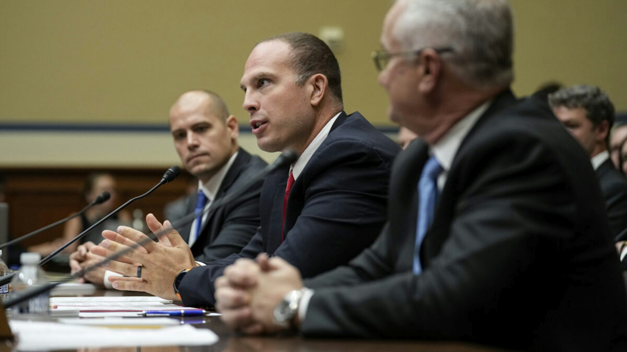 Ryan Graves, executive director of Americans for Safe Aerospace, David Grusch, former National Reconnaissance Officer Representative of Unidentified Anomalous Phenomena Task Force at the U.S. Department of Defense, and Retired Navy Commander David Fravor testify during a House Oversight Committee hearing titled "Unidentified Anomalous Phenomena: Implications on National Security, Public Safety, and Government Transparency" on Capitol Hill 26, 2023 in Washington, DC.