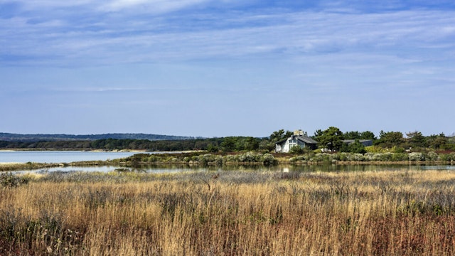 Rustic home in secluded waterfront on Tisbury Great Pond.