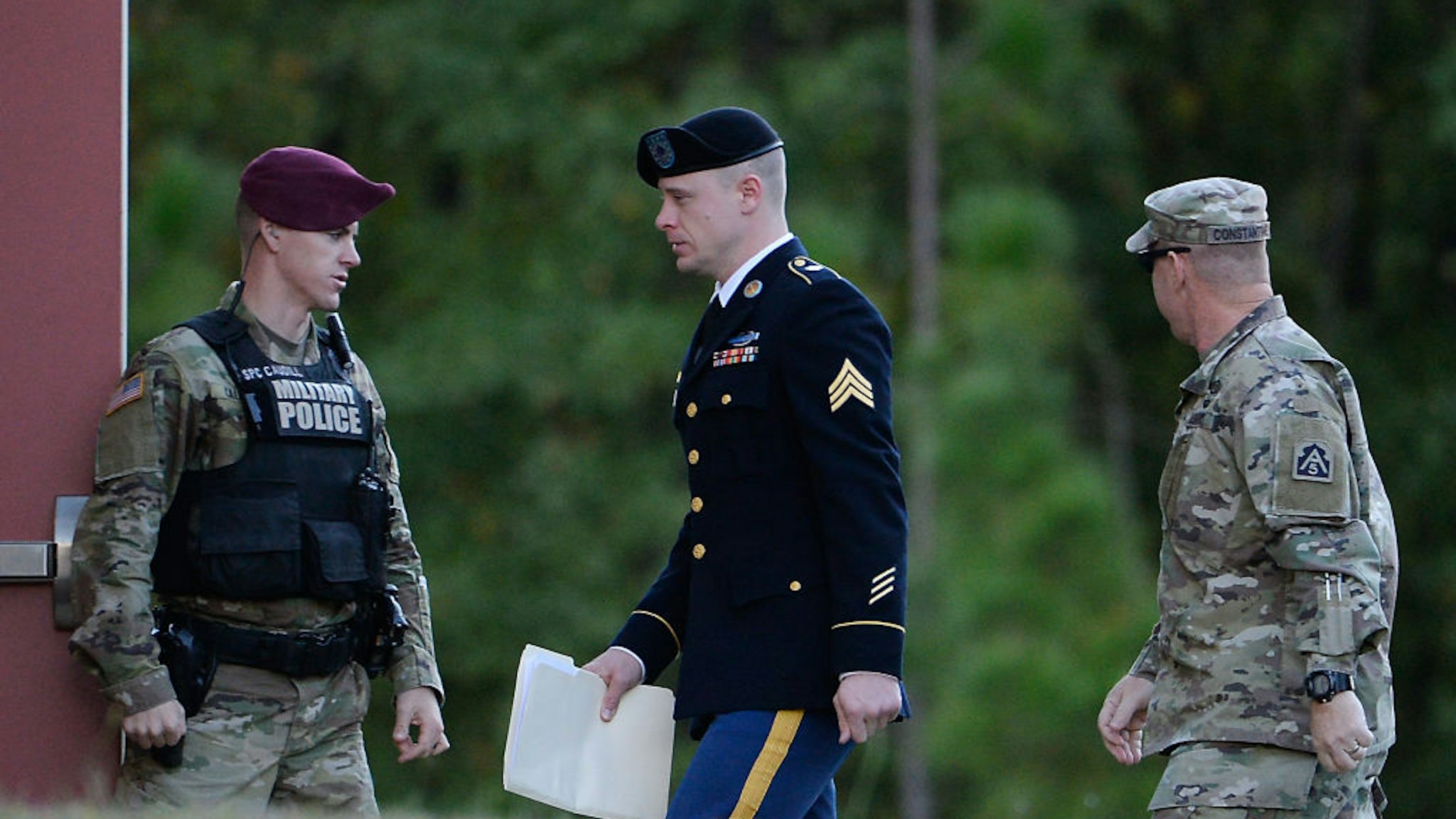 FORT BRAGG, NC - OCTOBER 30: U.S. Army Sgt. Robert Bowdrie 'Bowe' Bergdahl, 31 of Hailey, Idaho, (C) is escorted into the Ft. Bragg military courthouse for his sentencing hearing on October 30, 2017 in Ft. Bragg, North Carolina. Bergdahl pled guilty to desertion and misbehavior before the enemy stemming from his decision to leave his outpost in 2009, which landed him five years in Taliban captivity.