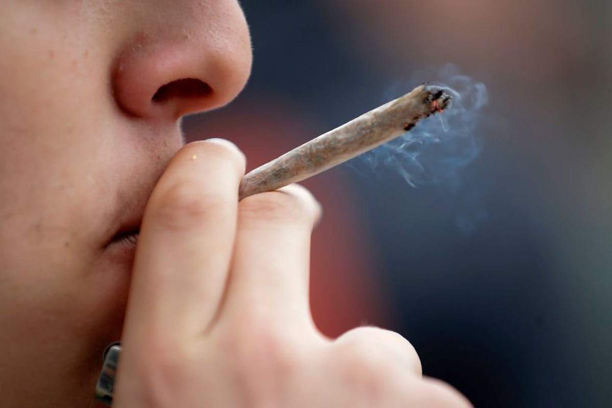 NextImg:Minnesota Cities Consider Banning Smoking Marijuana In Public Areas As Drug Nears Legalization