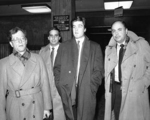 UNITED STATES - CIRCA 2000: Robert Chambers Jr., suspect in the murder of Jennifer Levin, along with his attorney Jack Litman (left) and his father Robert Chambers Sr. (right) as they leave Manhattan Criminal Court after a trial date was set. (Photo by Charles Frattini/NY Daily News Archive via Getty Images)