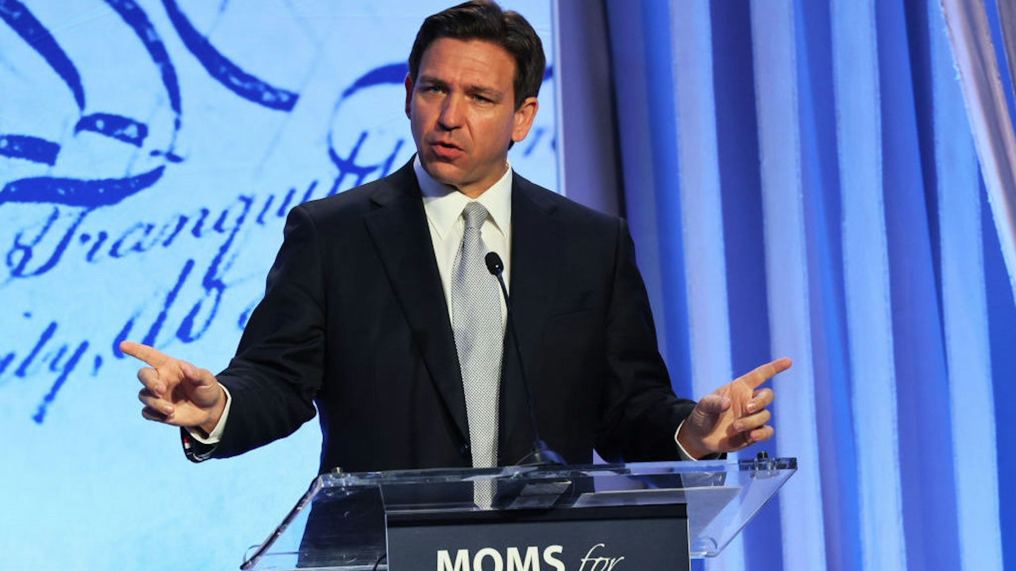 PHILADELPHIA, PENNSYLVANIA - JUNE 30: Republican presidential candidate Florida Gov. Ron DeSantis speaks during the Moms for Liberty Joyful Warriors national summit at the Philadelphia Marriott Downtown on June 30, 2023 in Philadelphia, Pennsylvania. The self-labeled "parental rights" summit is bringing school board hopefuls from across the country where attendees will receive training and hear from Republican presidential candidates which includes former U.S. President Donald Trump, Florida Gov. Ron DeSantis and former South Carolina Gov. Nikki Haley. The summit, which is being held in an overwhelmingly Democratic Philadelphia, have drawn protestors since the event was announced due to their pushing of book bans accusing schools of ideological overreach, including teaching about race, gender, and sexuality. (Photo by Michael M. Santiago/Getty Images)