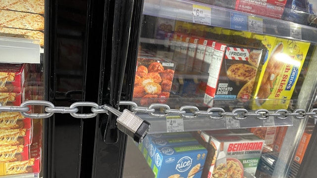 SAN FRANCISCO, CALIFORNIA - JULY 18: A chain with padlocks secures freezer doors at a Walgreens store on July 18, 2023 in San Francisco, California. A San Francisco Walgreens store has locked its freezers with chains and padlocks to thwart shoplifters that have been hitting the store on a regular basis and stealing frozen pizzas and ice cream.