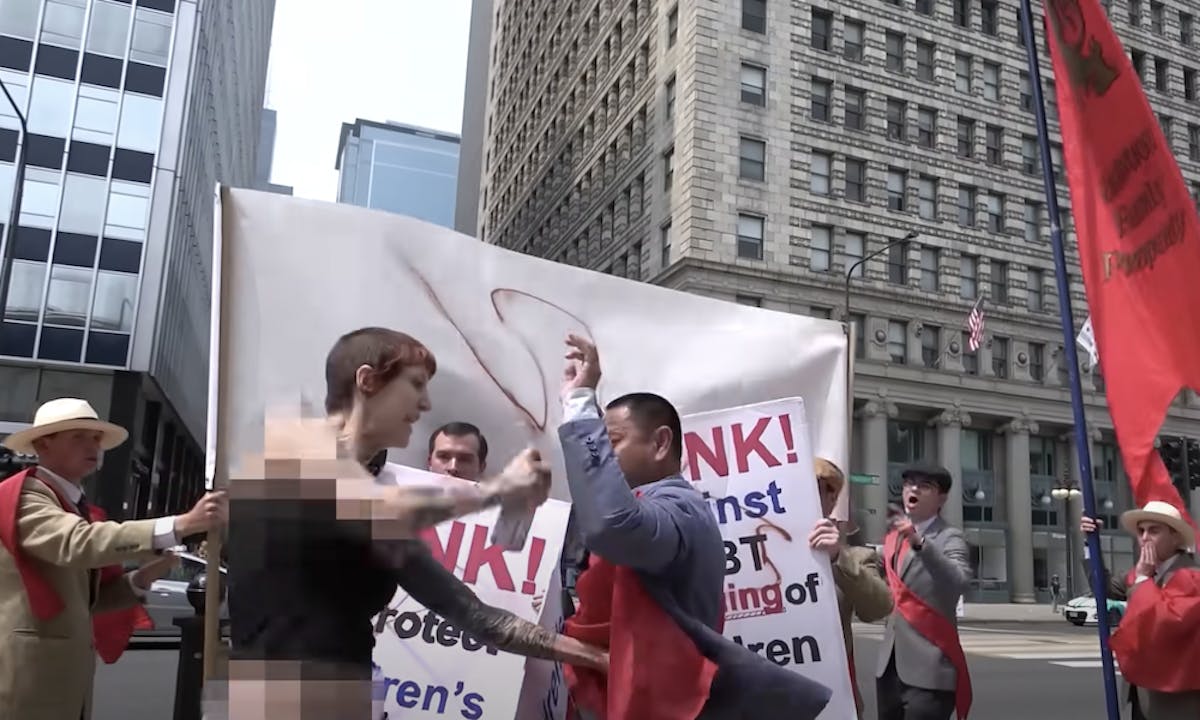 NextImg:WATCH: Catholic Group Protesting Drag Queen Story Hour Attacked, Hit With Spray Paint 