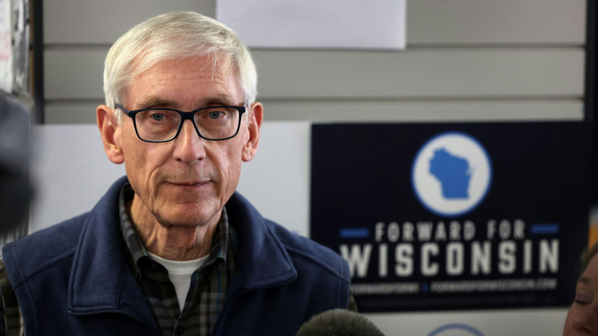 MILWAUKEE, WISCONSIN - NOVEMBER 07: Wisconsin Governor Tony Evers speaks to the press during a canvas launch event on November 7, 2022 in Milwaukee, Wisconsin. Evers, a Democrat, is in a tight race with his Republican challenger Tim Michels heading into tomorrow's election.