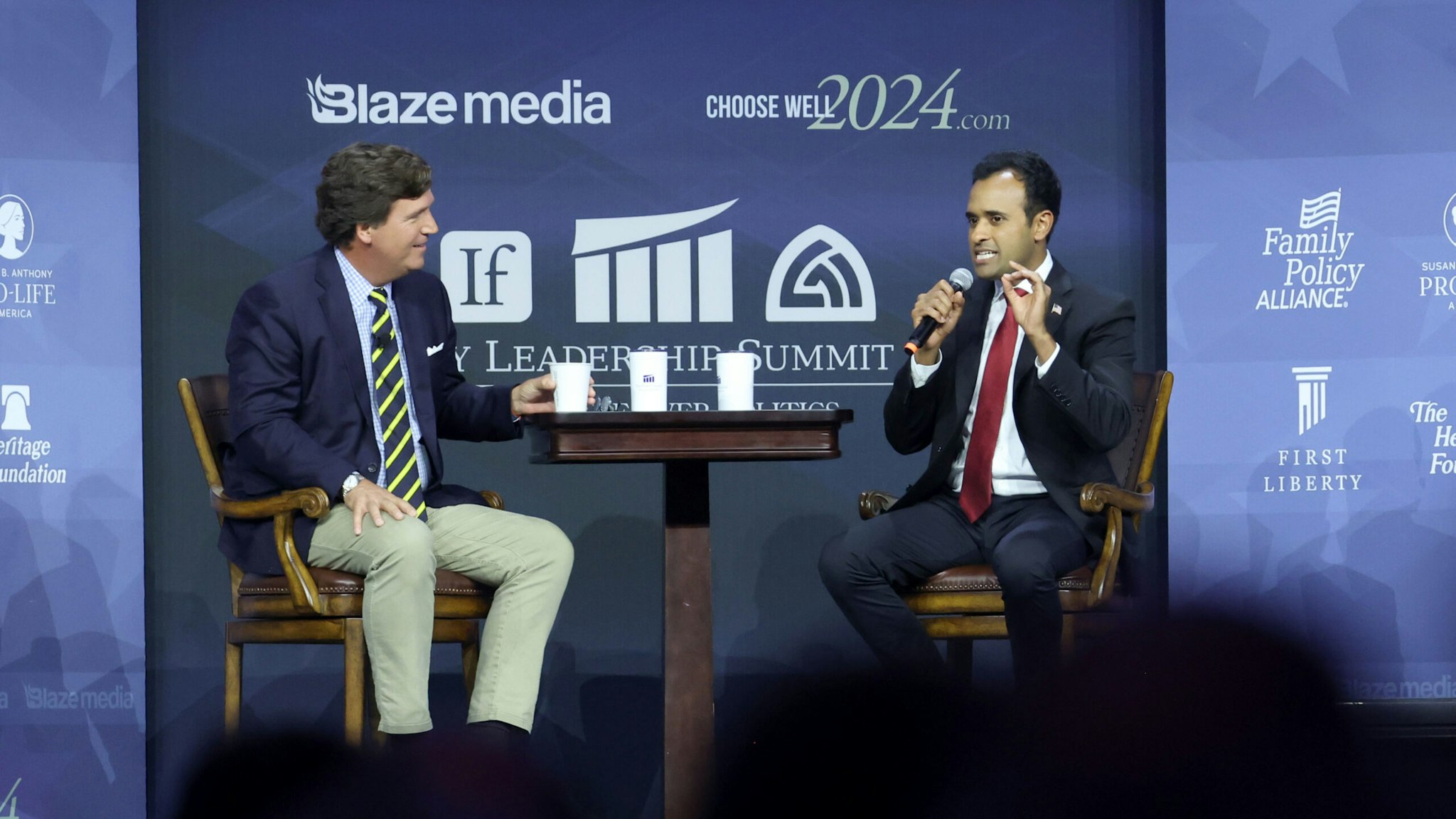 DES MOINES, IOWA - JULY 14: Republican presidential candidate Vivek Ramaswamy fields questions from former Fox News Television personality Tucker Carlson at the Family Leadership Summit on July 14, 2023 in Des Moines, Iowa. Several Republican presidential candidates were scheduled to speak at the event, billed as “The Midwest’s largest gathering of Christians seeking cultural transformation in the family, Church, government, and more.”