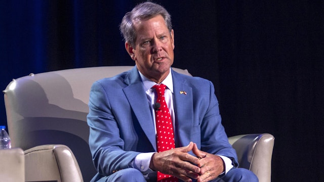 Brian Kemp, governor of Georgia, right, during a discussion at Erick Erickson's The Gathering event in Atlanta, Georgia, US, on Friday, Aug. 18, 2023. Republican presidential hopefuls are converging for a meeting of conservative activists, a chance to test their message before next week's debate and court voters.