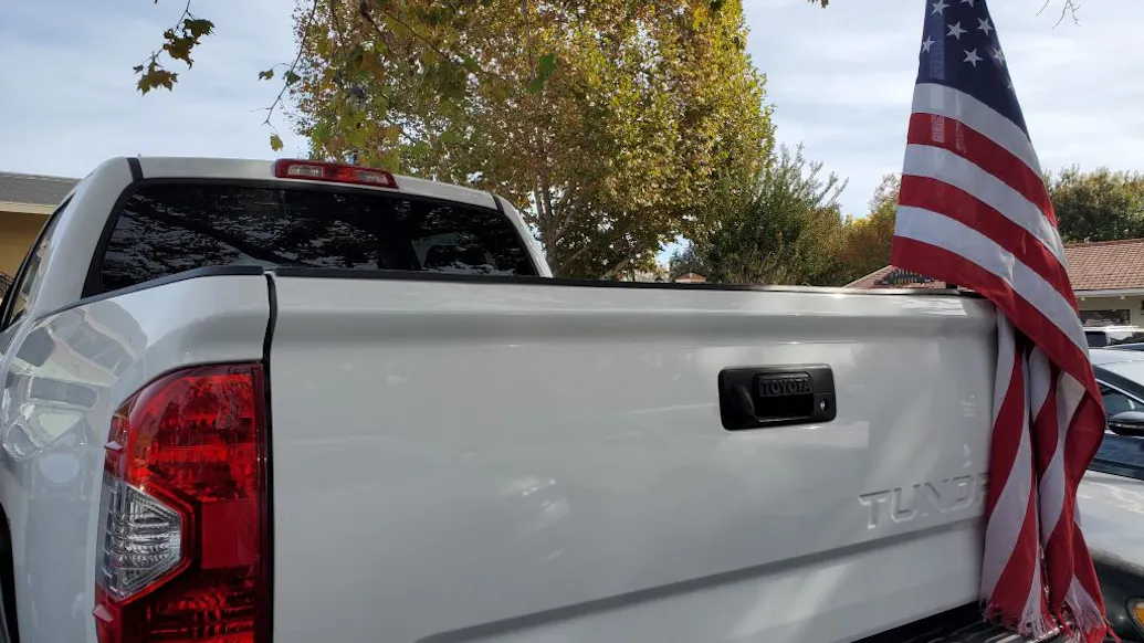 High School Tells Teenager To Remove His U.S. Flags From Truck. He Chooses Homeschooling Instead.