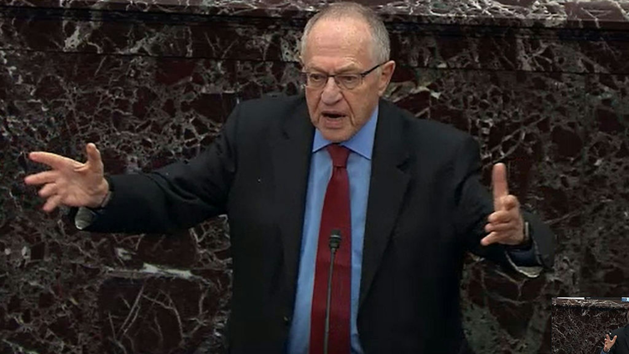 WASHINGTON, DC - JANUARY 29: In this screenshot taken from a Senate Television webcast, legal counsel for President Donald Trump, Alan Dershowitz answers a question from a senator during impeachment proceedings in the Senate chamber at the U.S. Capitol on January 29, 2020 in Washington, DC. Senators have 16 hours to submit written questions to the House managers and the President's defense team. (Photo by Senate Television via Getty Images)