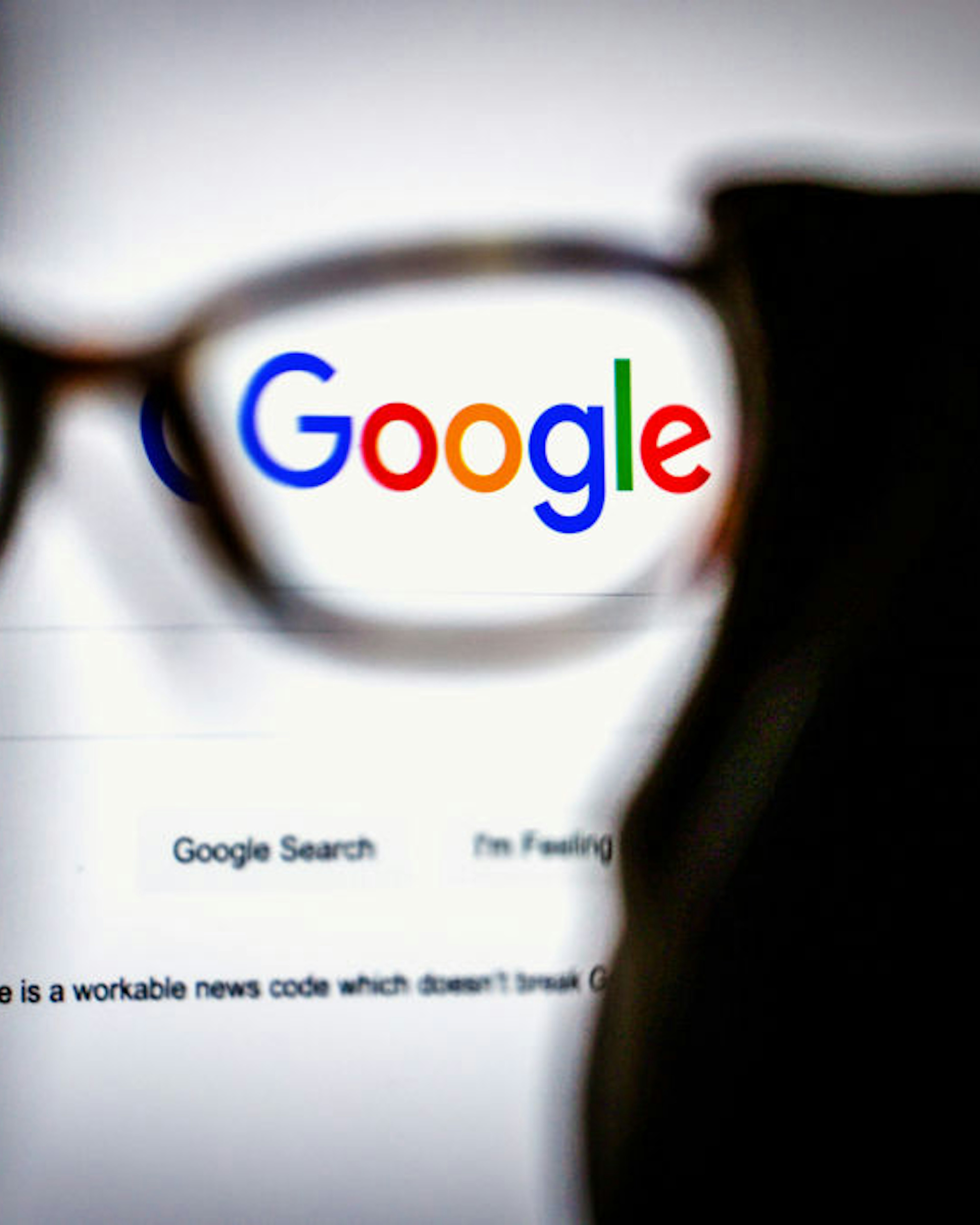 A link to Google's proposal to a workable news code on the company's homepage, arranged on a desktop computer in Sydney, Australia, on Friday, Jan. 22, 2021. Google threatened to disable its search engine in Australia if its forced to pay local publishers for news, a dramatic escalation of a months-long standoff with the government. Photographer: David Gray/Bloomberg via Getty Images