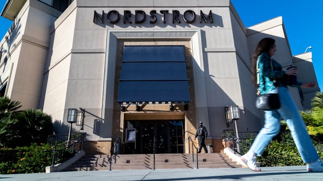 LOS ANGELES, CA - NOVEMBER 23, 2021: A security guard patrols the front entrance of Nordstrom on Tuesday after an organized group of thieves attempted a smash-and-grab robbery late Monday night at The Grove location November 23, 20201 in Los Angeles, California. (Gina Ferazzi / Los Angeles Times via Getty Images)