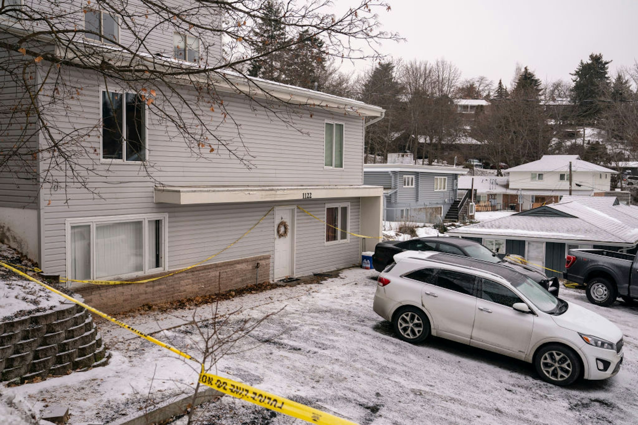 Police tape surrounds a home that is the site of a quadruple murder on January 3, 2023 in Moscow, Idaho.