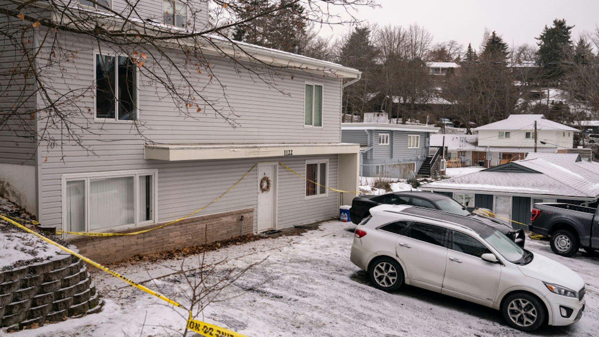 Police tape surrounds a home that is the site of a quadruple murder on January 3, 2023 in Moscow, Idaho.