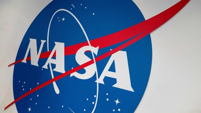 The NASA logo is displayed at the Earth Information Center exhibit, at NASA headquarters in Washington, DC, on June 21, 2023. NASA's Earth Information Center, which is part physical, part online, is an effort that blends science and visualizations to allow visitors to see how our planet is changing.