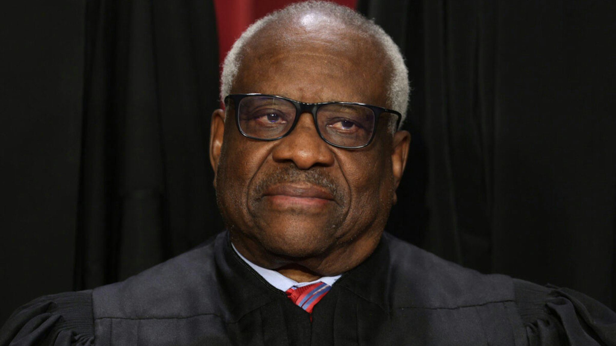 United States Supreme Court Associate Justice Clarence Thomas poses for an official portrait at the East Conference Room of the Supreme Court building on October 7, 2022 in Washington, DC.
