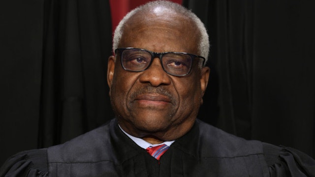 United States Supreme Court Associate Justice Clarence Thomas poses for an official portrait at the East Conference Room of the Supreme Court building on October 7, 2022 in Washington, DC.
