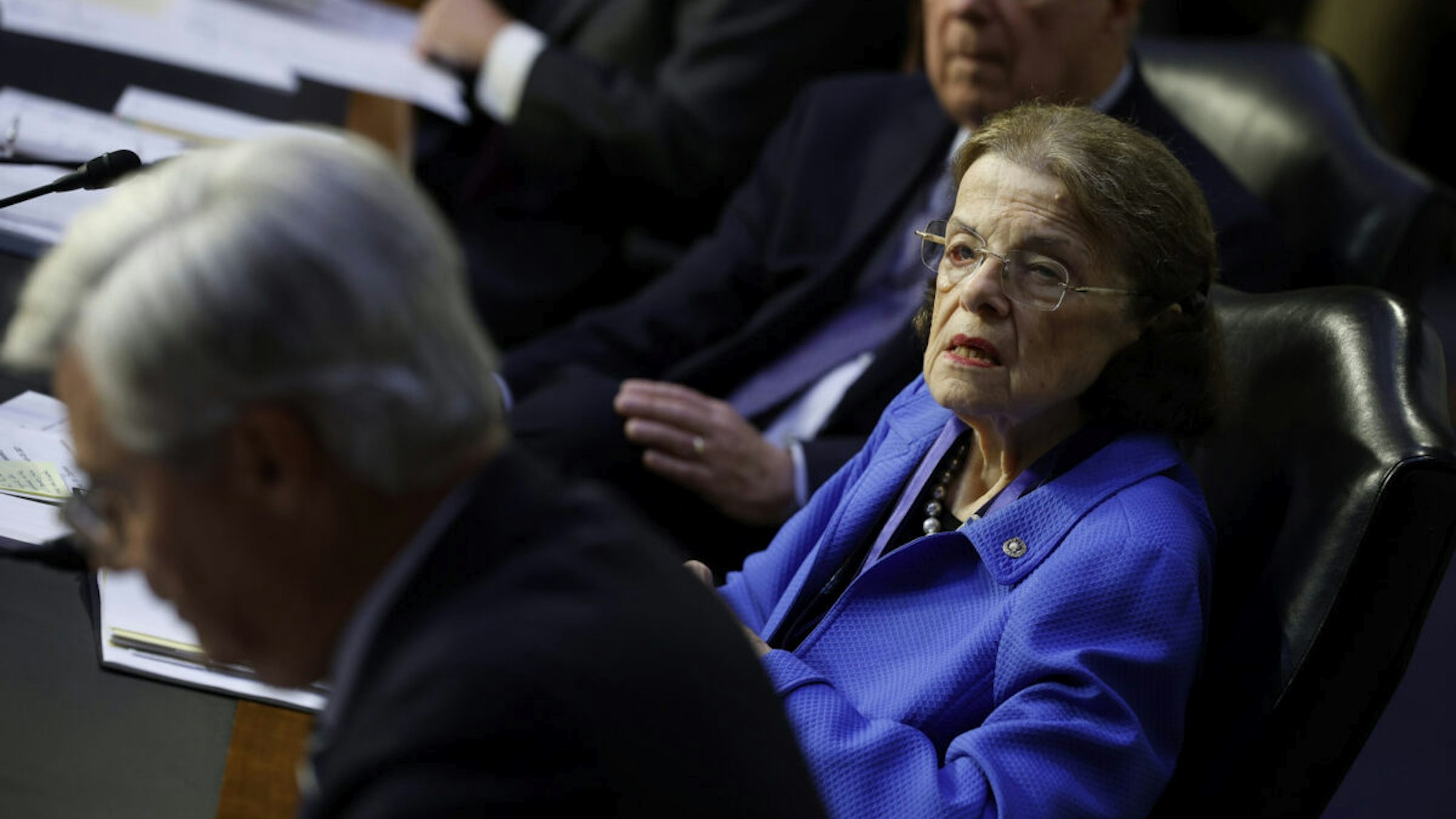 Senate Judiciary Committee member Sen. Dianne Feinstein (D-CA) (C) and Chairman Richard Durbin (D-IL) listen to debate during a committee business meeting about Supreme Court ethics reform in the Hart Senate Office Building on Capitol Hill on July 20, 2023 in Washington, DC.