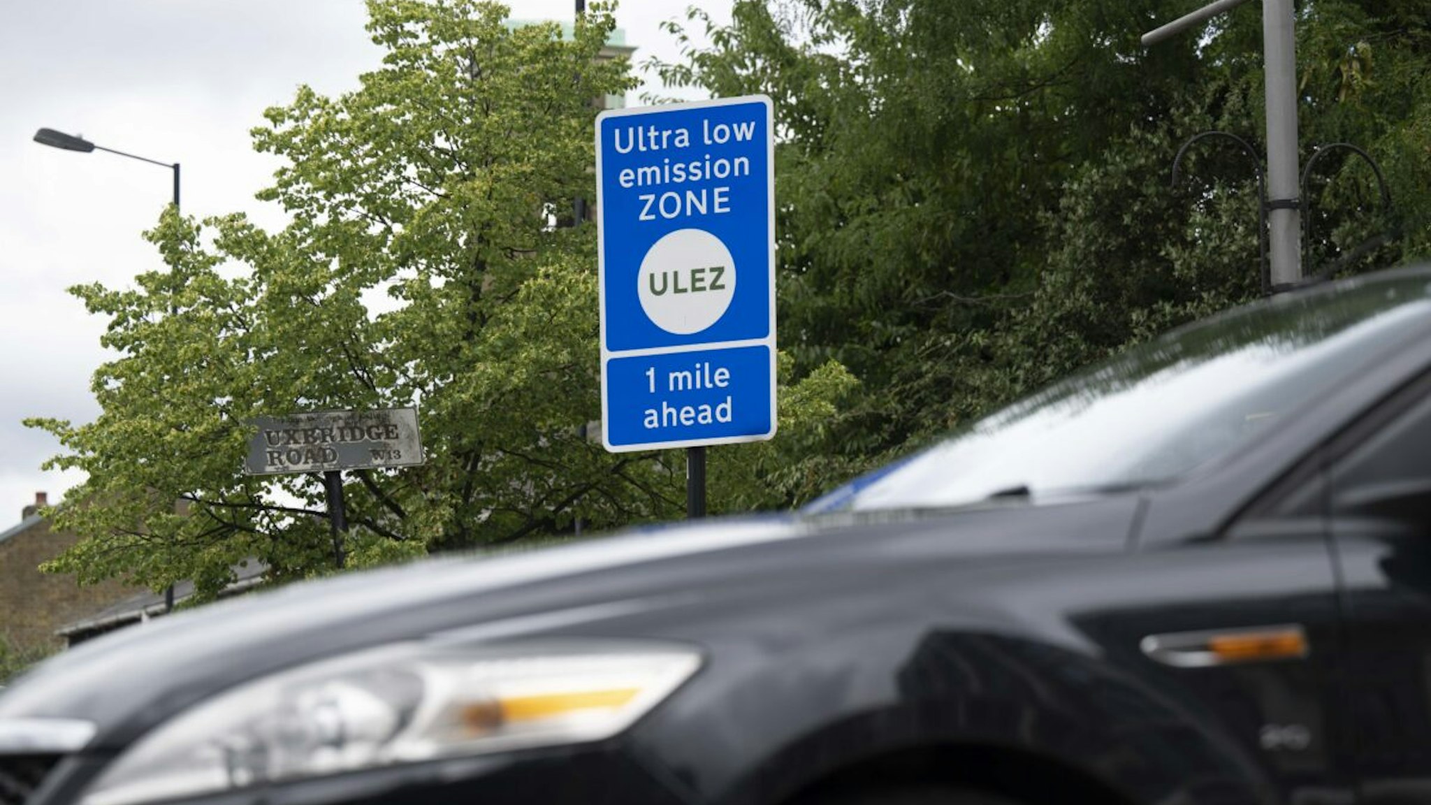 A sign indicating Ultra Low Emissions Zone (ULEZ) is seen on the street in London, United Kingdom on August 04, 2023.