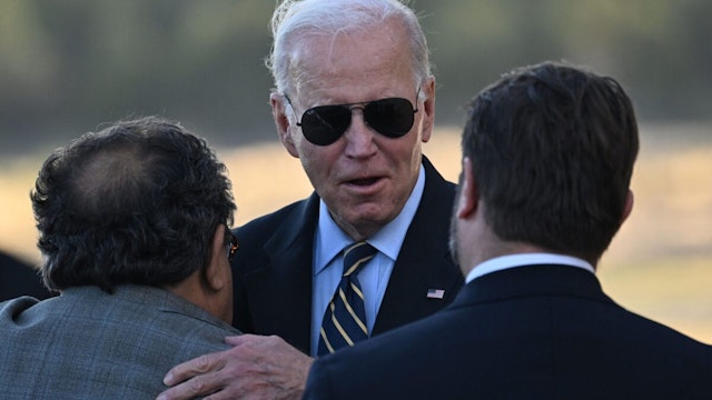 US President Joe Biden is greeted as he arrives at Grand Canyon National Park Airport in Grand Canyon Village, Arizona, on August 7, 2023.